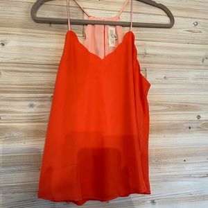 Orange tank top scallop neckline